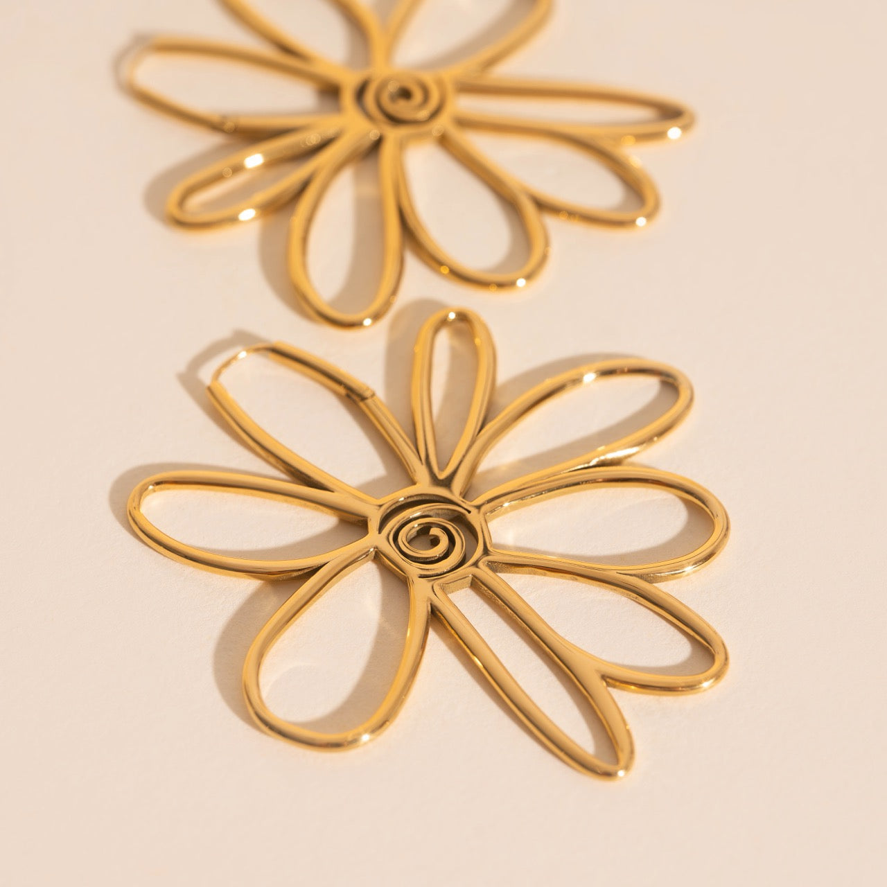 Jumbo floral huggie earring